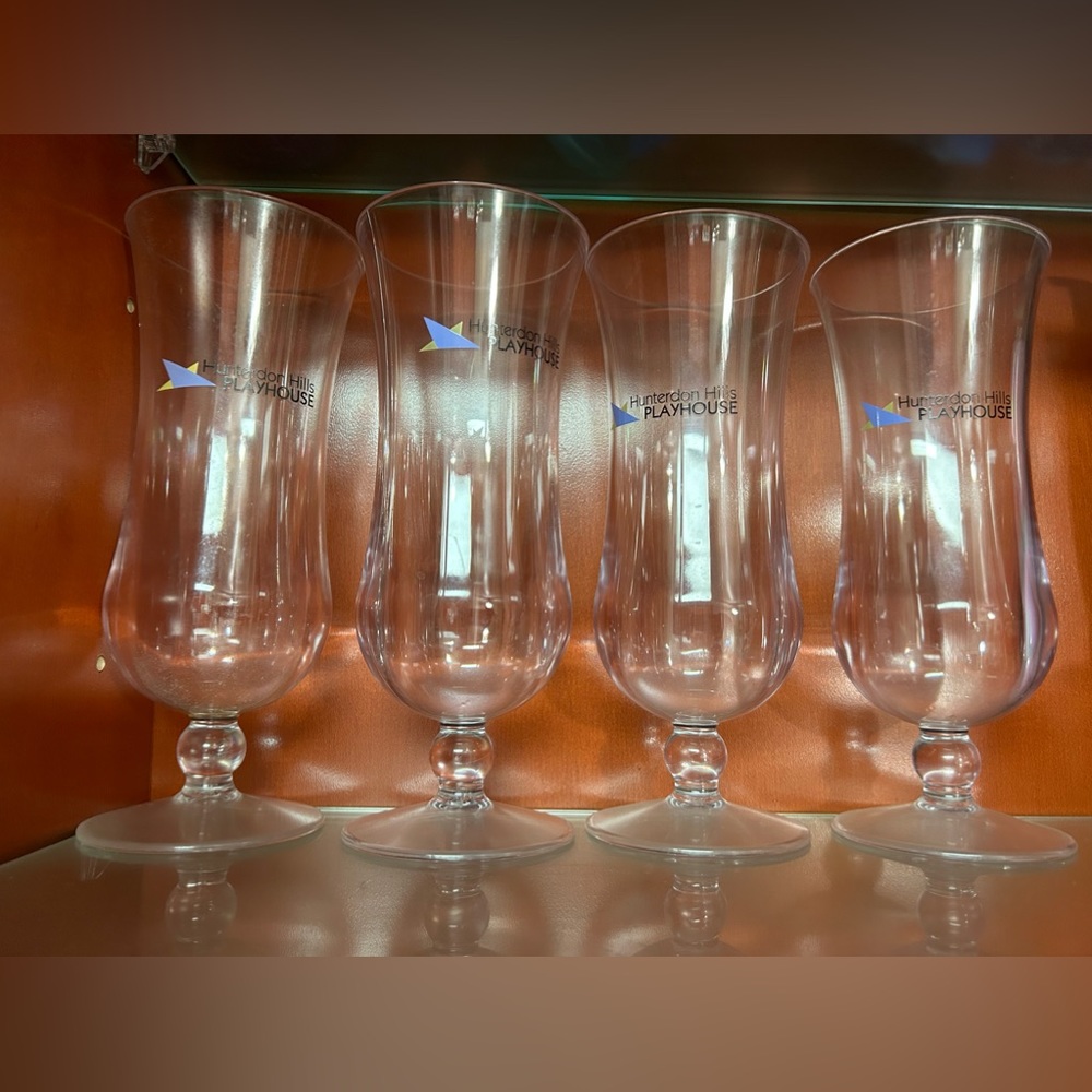 This is a collectors item cocktail glass from Huntington Hills playhouse